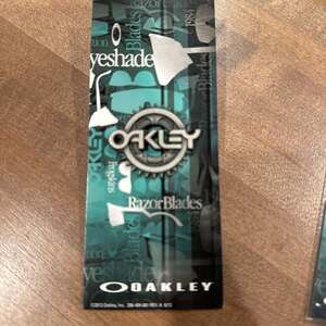 Oakley Heritage 30 Year Razor Blades Pin Display and guitar pick